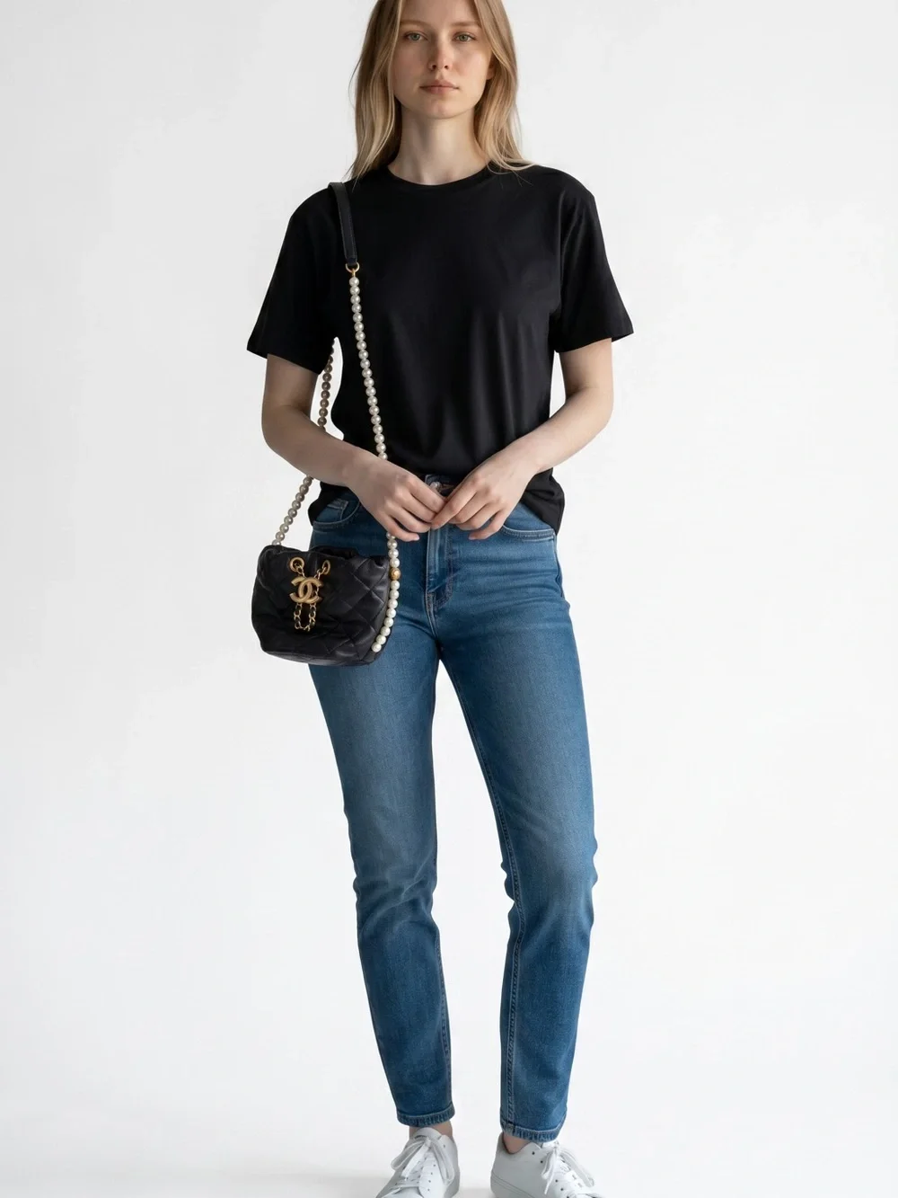CHANEL Pearl Drawstring Bucket Bag in Black Quilted Lambskin with Pearl Strap